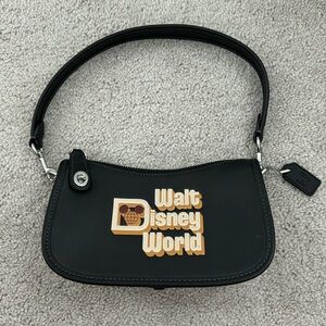 Disney Parks x Coach . Walt Disney World leather bag.